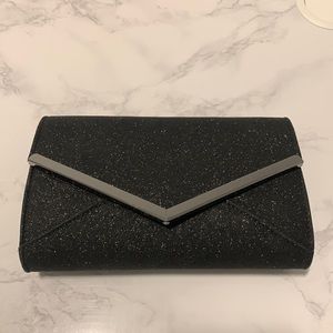 *2 items for $20* Like new Taxi black sparkle clutch